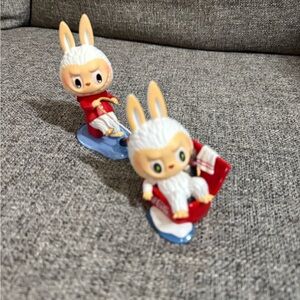 Two Coca Cola labubu